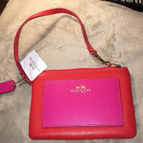 Coach Handbags - Coach YR limited bi-color wristlet orange & pink